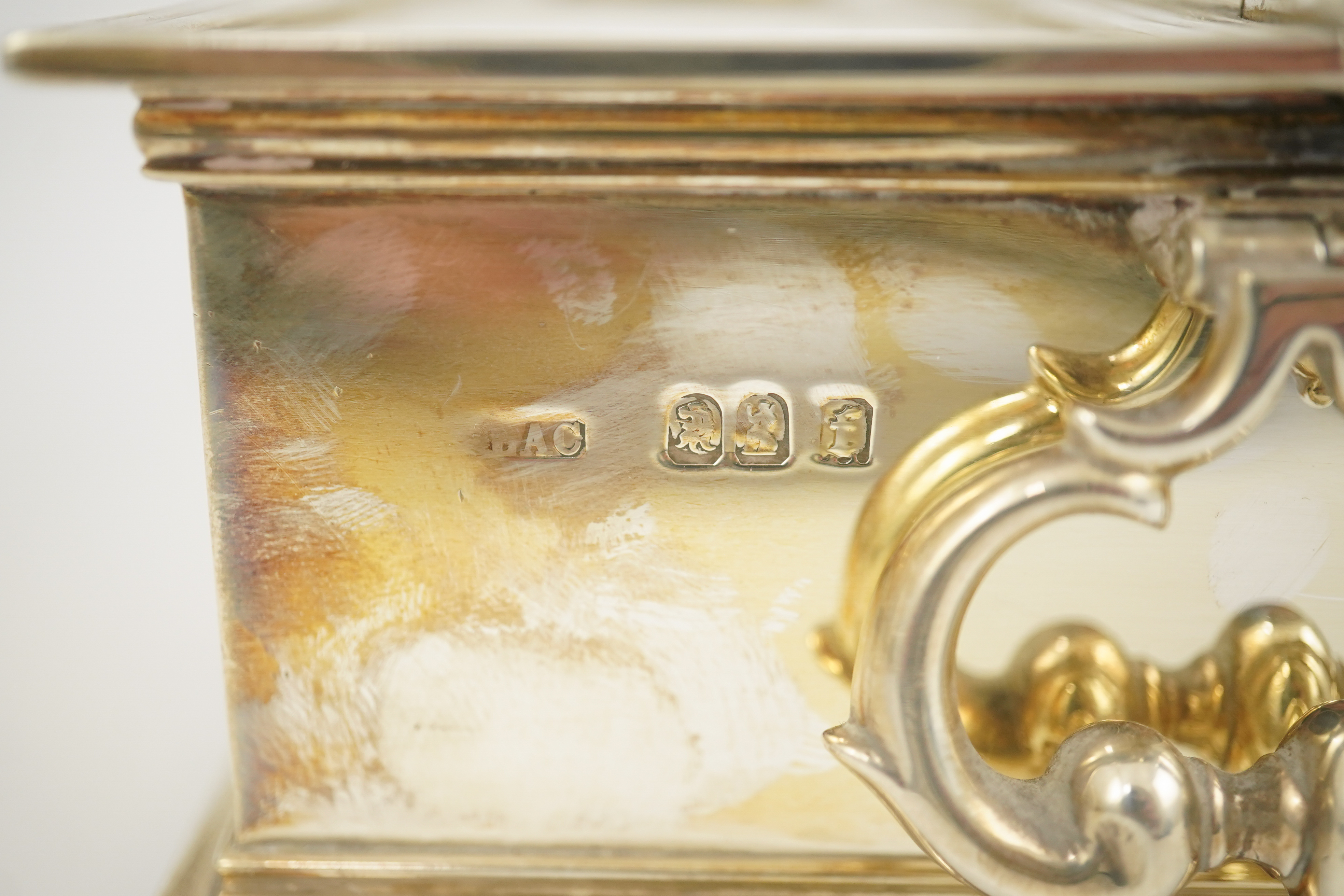 A George V Britannia standard silver and enamel combination ‘treasury inkstand/ cigarette box, by Crichton Brothers